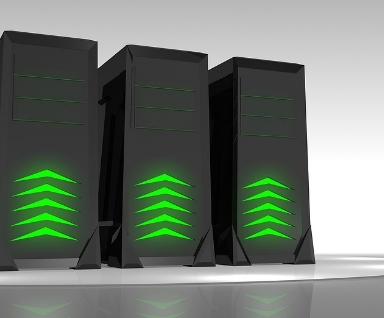 Three black server towers with glowing green indicator lights